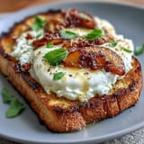 Honey Peach Burrata Toast with golden toasted sourdough, creamy burrata, and fresh peach slices drizzled with honey for a perfect spring brunch.