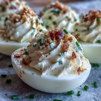 Creamy deviled eggs with tangy cream cheese and bold everything bagel seasoning, perfect for brunch or parties.  